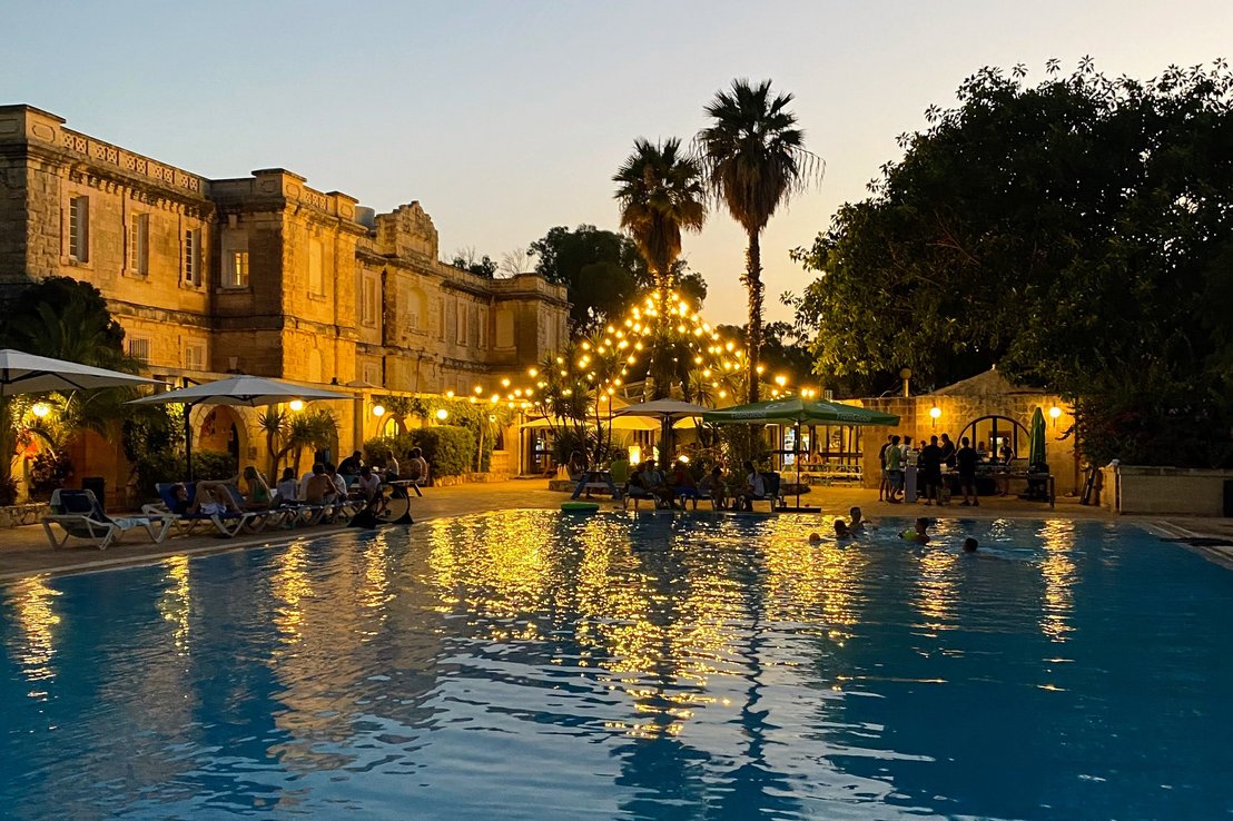 coliving campus in malta at night